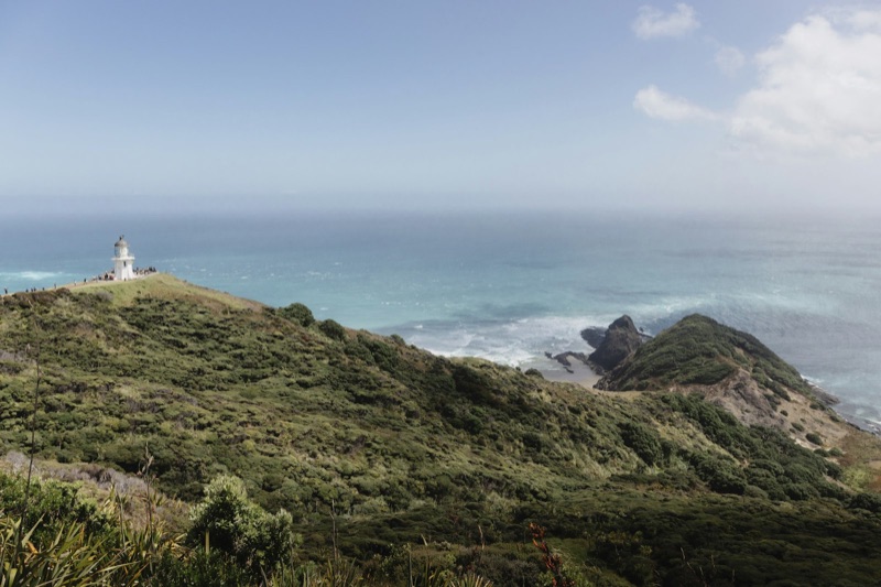 The Cape Reinga lighthouse above the meeting of two oceans at the top of New Zealand