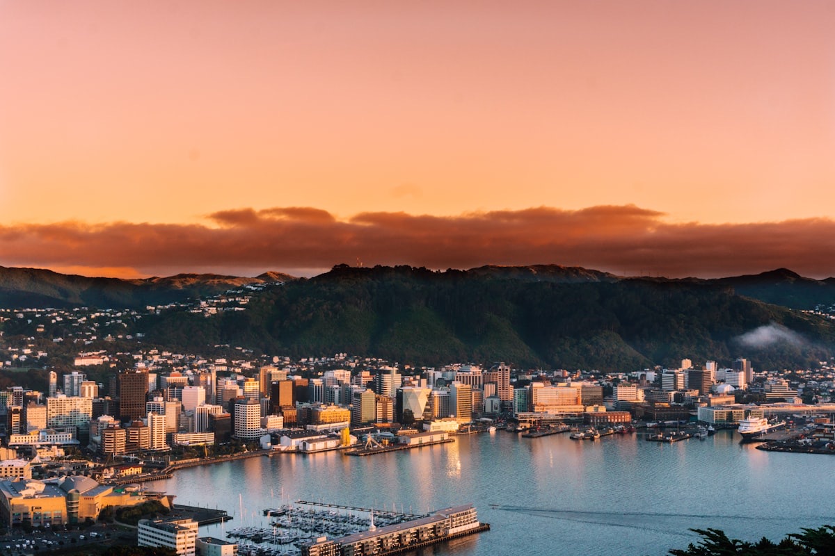 Wellington harbour and city at sunset, the southern end of the North Island and the Cook Strait ferry port