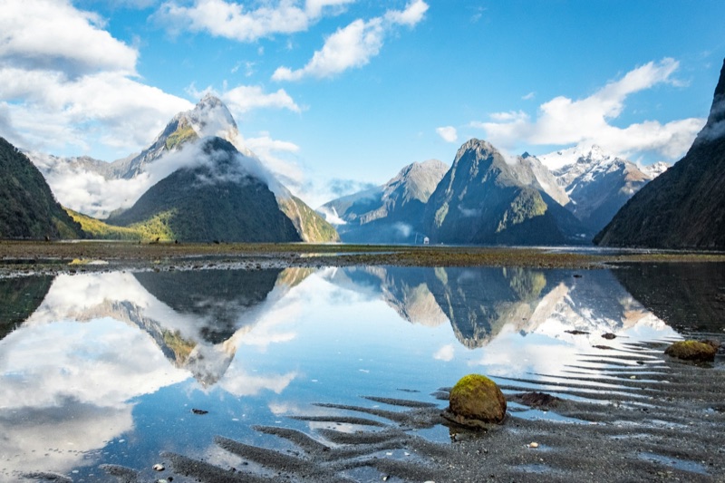 Mitre Peak reflected in Milford Sound, the end of the drive from Queenstown via Te Anau